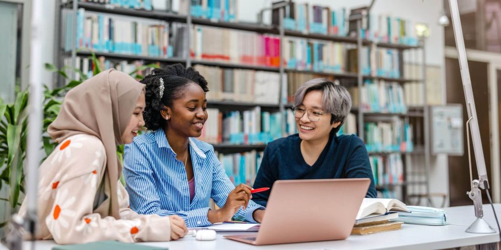 College students studying with laptop