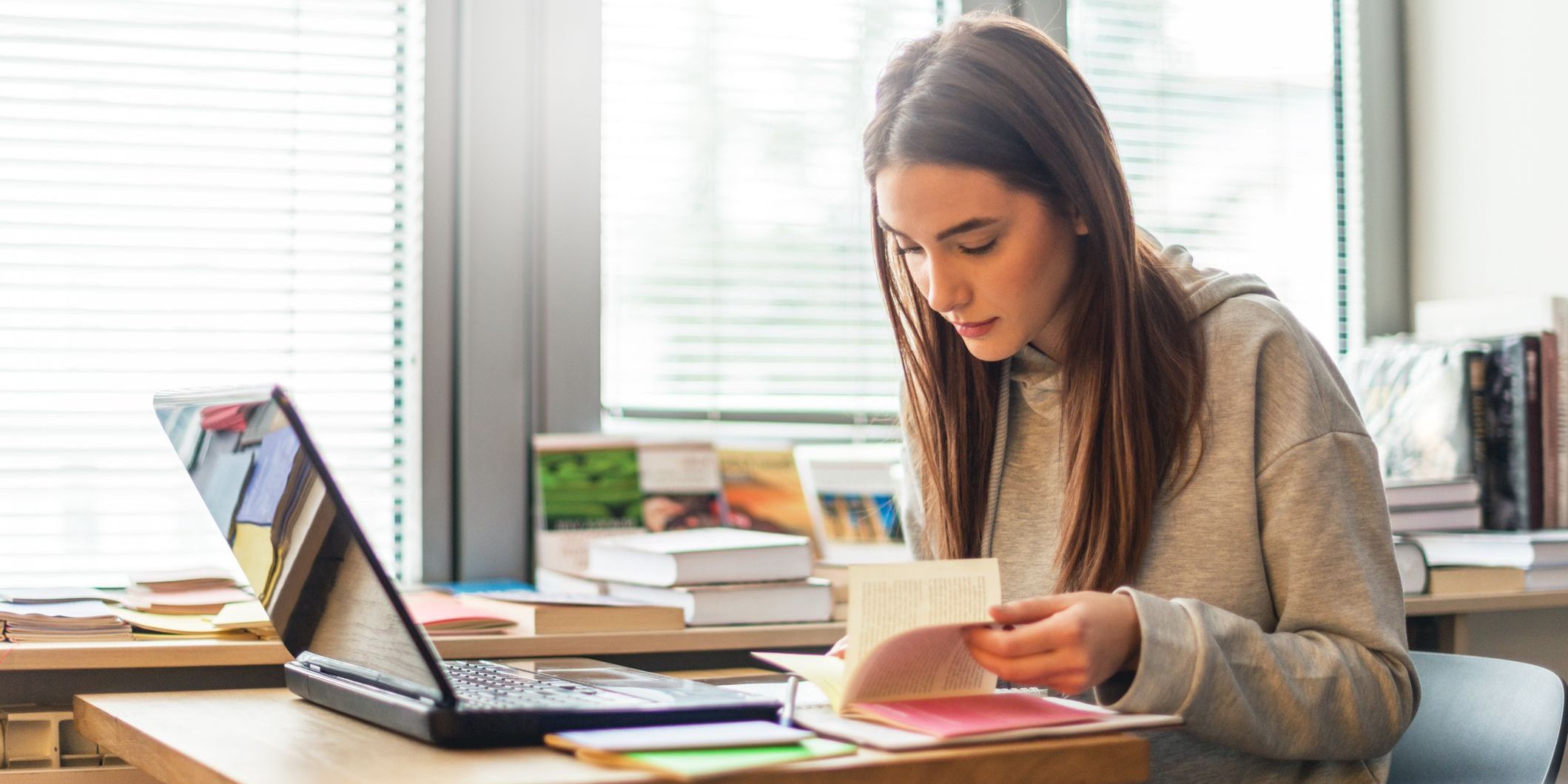 Female student learning in library