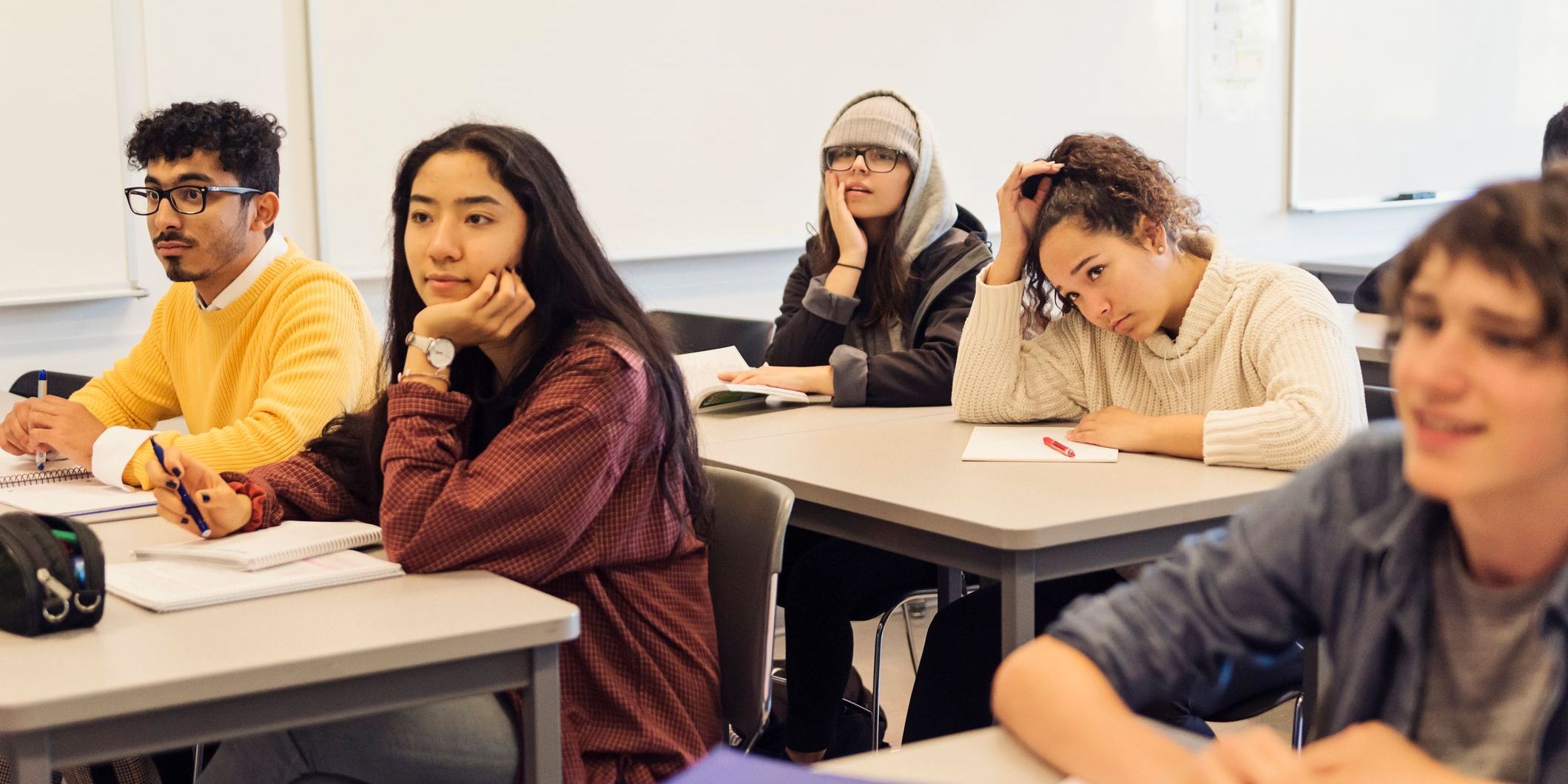 College students in classroom.