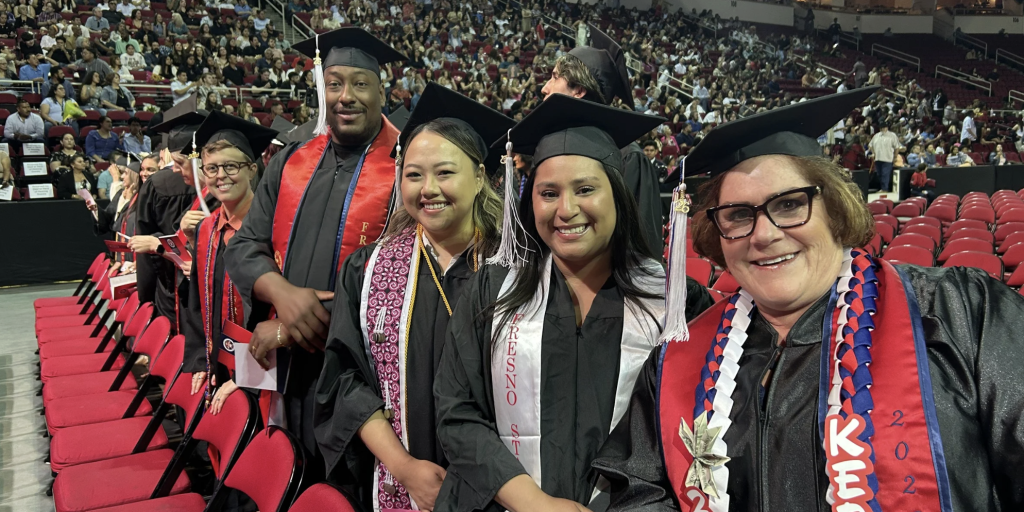 CSU students smiling on graduation day